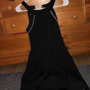 black dress with pearls on side